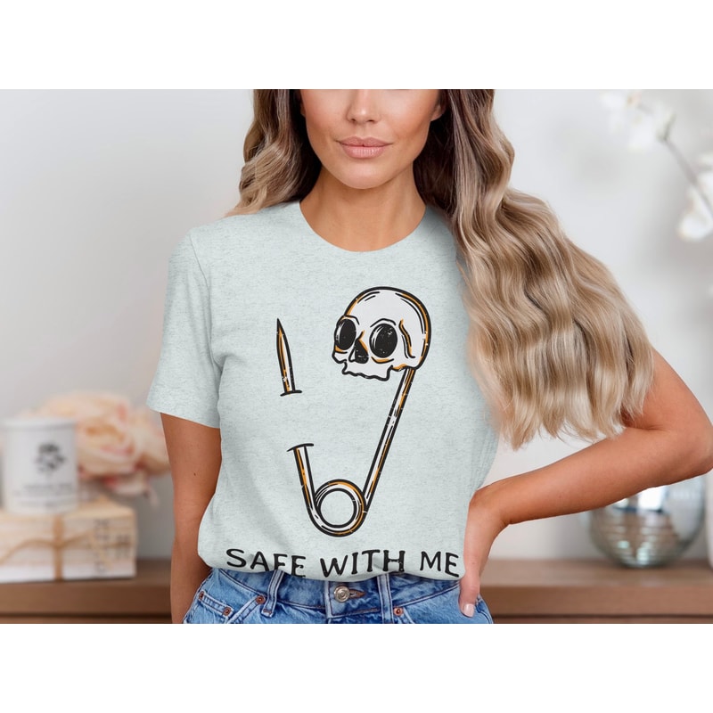 Skull Safety Pin Graphic Tee, Safe With Me T-Shirt, Punk Rock Skull Tee, Edgy Safety Pin Graphic Tee, Unique Skull Design Shirt.jpg