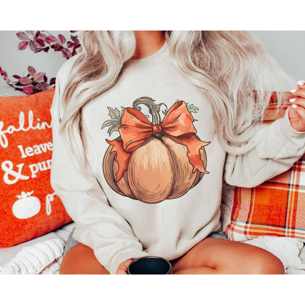 Cute Fall Pumpkin with Coquette Bow Watercolor Comfort Colors T-shirt, Coquette Halloween Girl Shirt, Pumpkin Halloween, Spooky Season Gift.jpg
