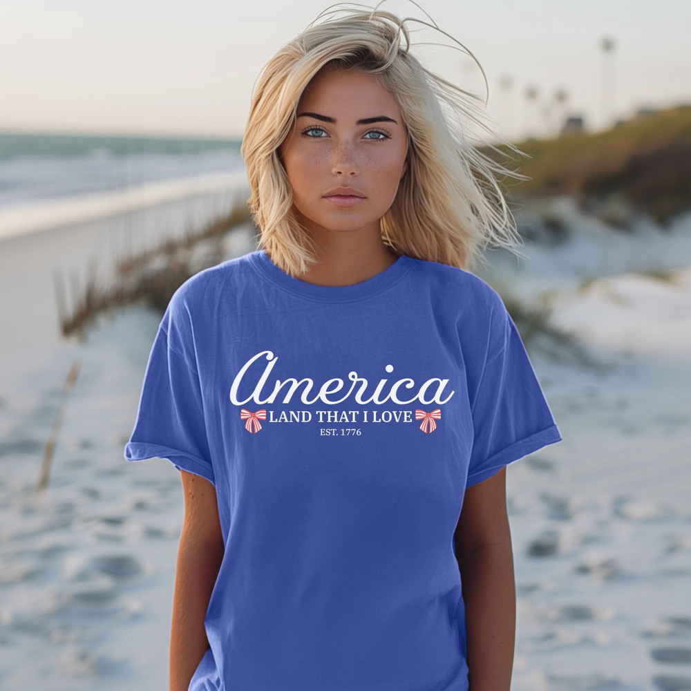 America Land That I Love T-shirt, 4th of July Shirt, Patriotic Shirt, Women's Trendy graphic tee, Coquette Bow, Comfort Colors, Summer Shirt.jpg