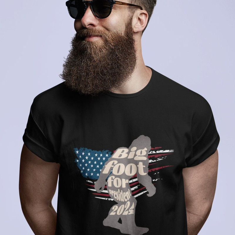 Bigfoot with Flag Funny President Shirt Sasquatch Shirt Election Shirt Political Shirt Sarcastic Shirt Vote Shirt Holiday Gift Inappropriate.jpg