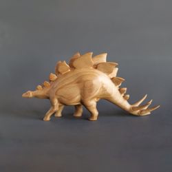 Wooden hand carved dinosaur stegosaurus, dinosaur figurine