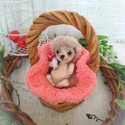 Crocheted hedgehog with wicker basket. Small stuffed animal hedgehog toy amigurumi. Tiny animal gift in basket.