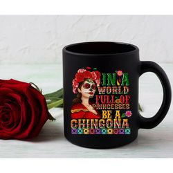in a world full of princesses be a chingona black ceramic mug, strong latina coffee mug, chicano power cup