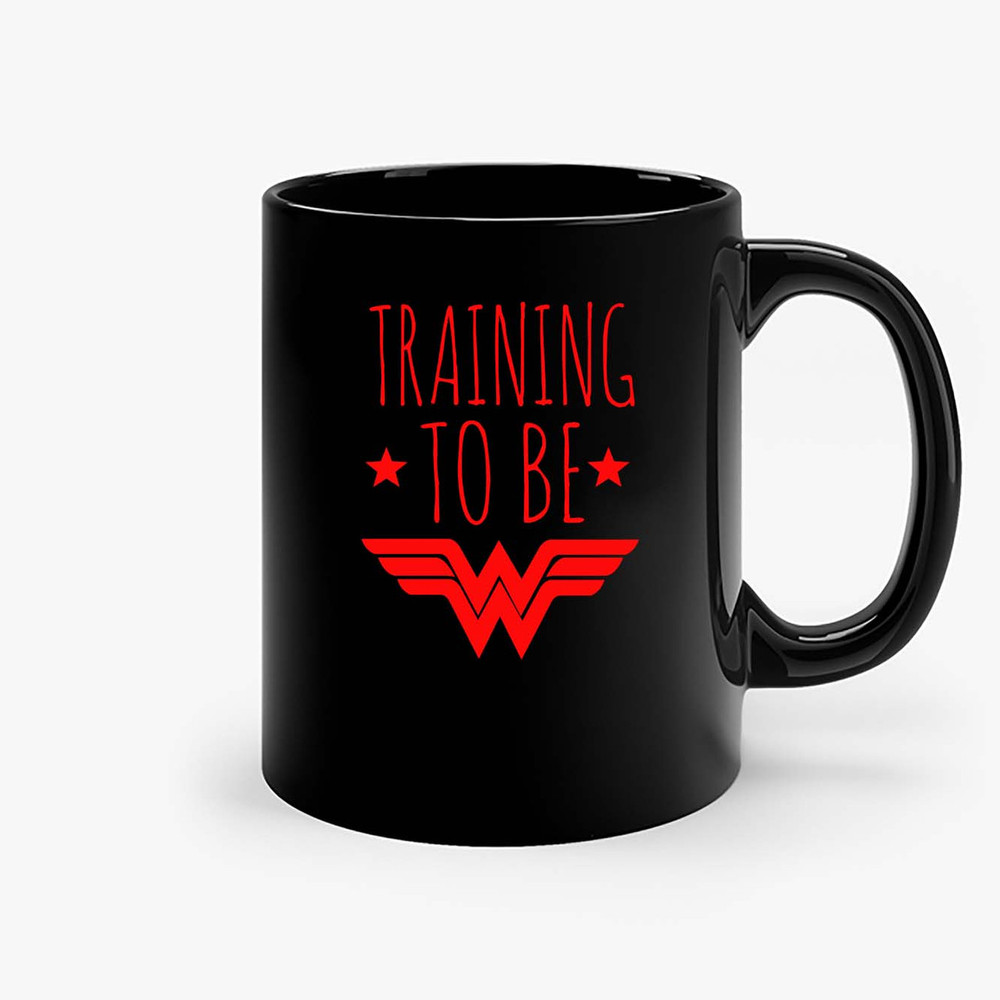 Training To Be Wonder Women Ceramic Mugs.jpg