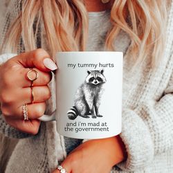 my tummy hurts raccoon, ceramic mug 11oz, funny racoon mug gift, tummy ache mug, trashcore mug, funny political gag gift