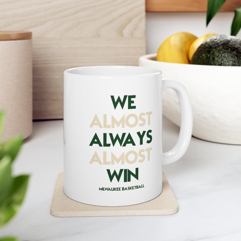 Milwaukee Bucks We Almost Always Almost Win Basketball Mug White Glossy Mug Perfect Gift Idea Funny NBA Gift Sport Themed Mug.jpg
