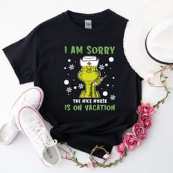 spread some cheer with this nurse christmas shirt - perfect for grinch-loving nurses! 1