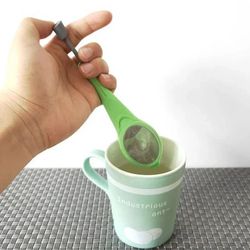 reusable tea infuser with built-in plunger for intense flavor