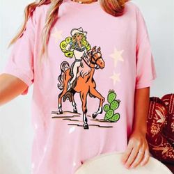 western graphic tee, retro rodeo doll tshirt, cowgirl graphic t shirt, comfort colors shirt, western doll, pink cowgirl