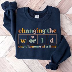 changing the world one phoneme at a time sweatshirt, dyslexia teacher shirt, teach kids to read shirt, kindergarten teac