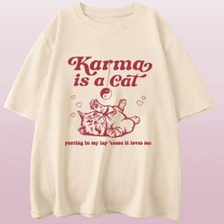 Taylor Swift Karma Is a Cat T-Shirt: Embrace the comfy and fashionable Vibes with this Swiftie Merch shirt. Taylor Swift