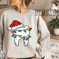 tooth christmas light santa hat shirt, dentist dental hygienist t-shirt, santa hat tooth shirt, gift for dentist