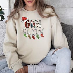 custom gigi claus sweatshirt, grandma christmas sweatshirt, christmas gift for grandma, custom nana and grandkids sweats