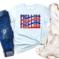 phillies jersey short sleeve tee, wavy boho lettering, red and blue, phillies, red october, bryce harper, baseball game