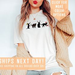 black cat shirt gift for christmas, cat mom shirt, santa hat cat tshirt,christmas tree light sweater,xmas elf cat hoodie