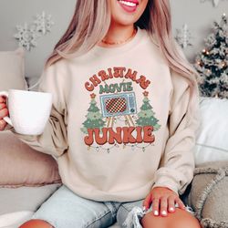 christmas movie junkie sweatshirt, retro christmas movie hoodie, christmas holiday sweater, christmas tree hoodie, vinta