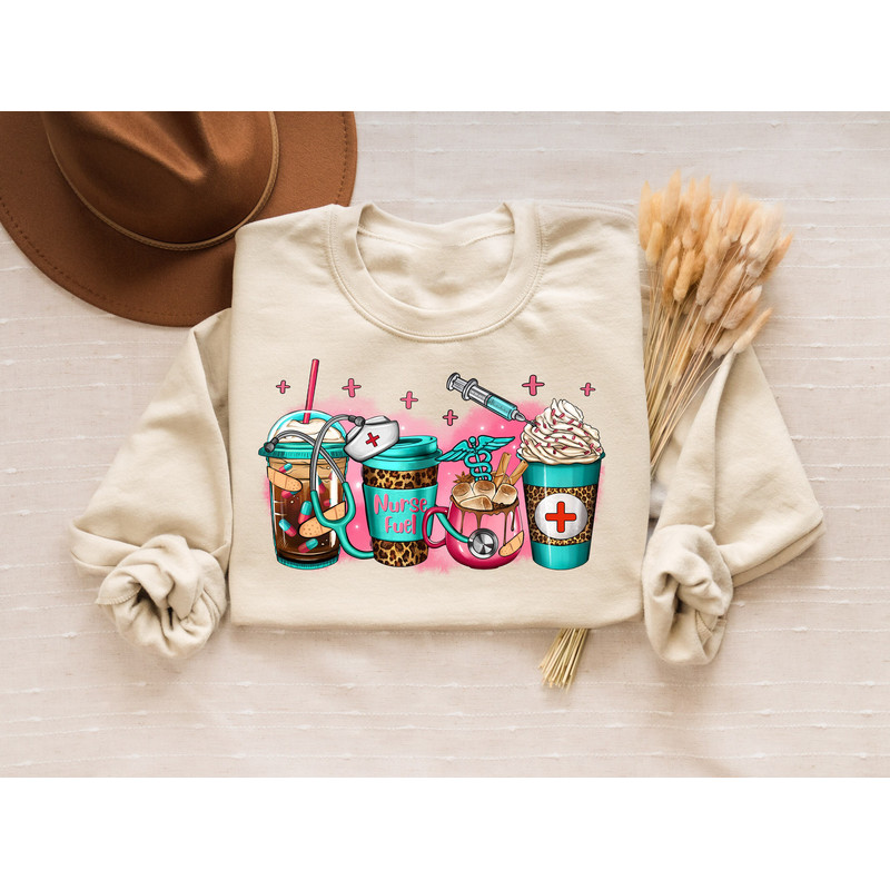 Christmas Nursing Crewneck Sweatshirt, Cute Nurse T-Shirt, Holiday Nurse Sweatshirt, Nursing School Sweater, Funny Nurse Shirt, Nurse Gifts.jpg