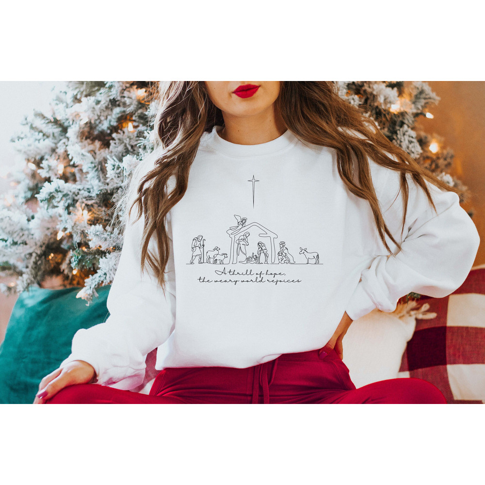 A Thrill Of Hope The Weary World Rejoices Sweatshirt, Jesus Is The Reason Gift,Christmas Jesus Nativity Shirt,Christian Christmas Sweatshirt.jpg