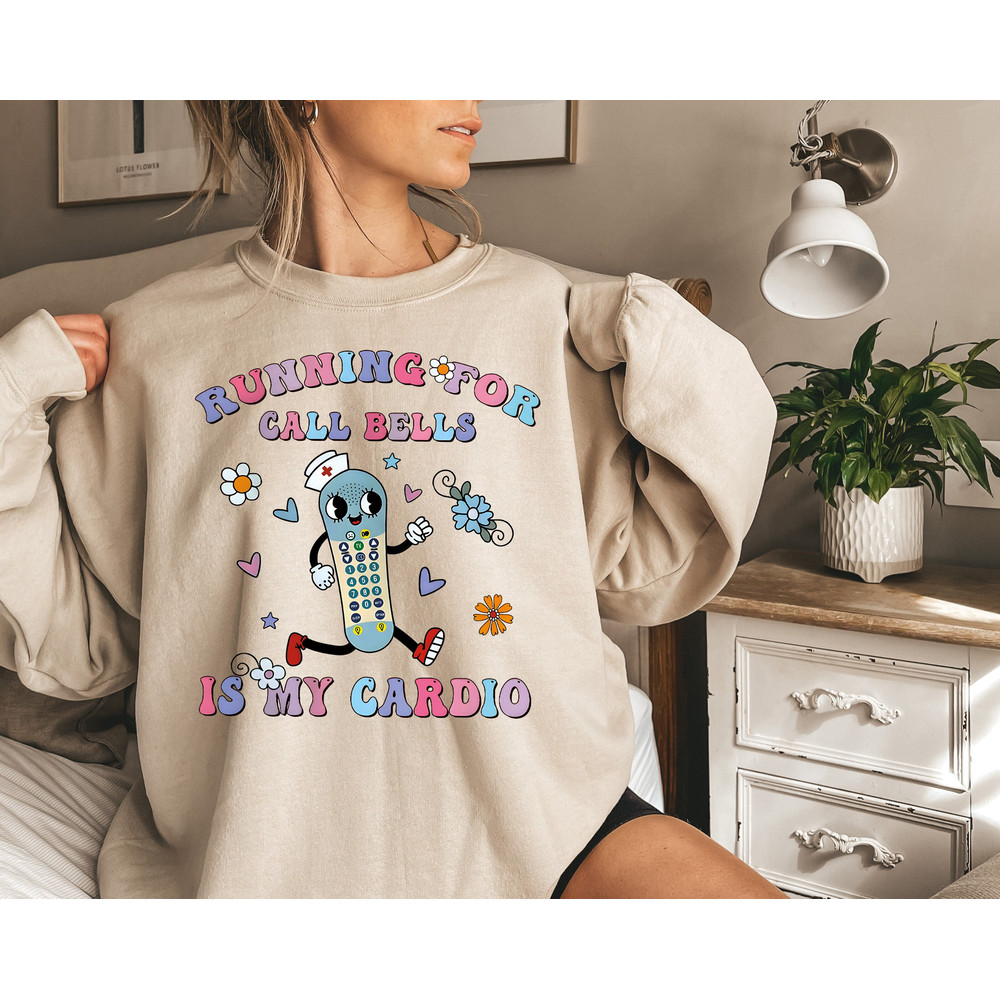Running For Call Bells Is My Cardio Shirt, Flower Nurse Shirt, Funny PCT Shirt, Funny CNA Shirt, Funny Nurse Sweatshirt, Cute Gift for Nurse.jpg