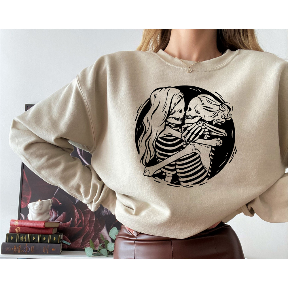 Aesthetic Skeleton Lesbian Couple Sweatshirt, Queer Love Apparel, Lesbian Bridal Party Hoddie, Pride Month Tee, Hugging Skeletons Shirt.jpg