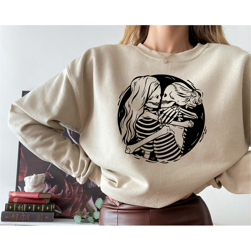 Aesthetic Skeleton Lesbian Couple Sweatshirt, Queer Love Apparel, Lesbian Bridal Party Hoddie, Pride Month Tee, Hugging Skeletons Shirt.jpg
