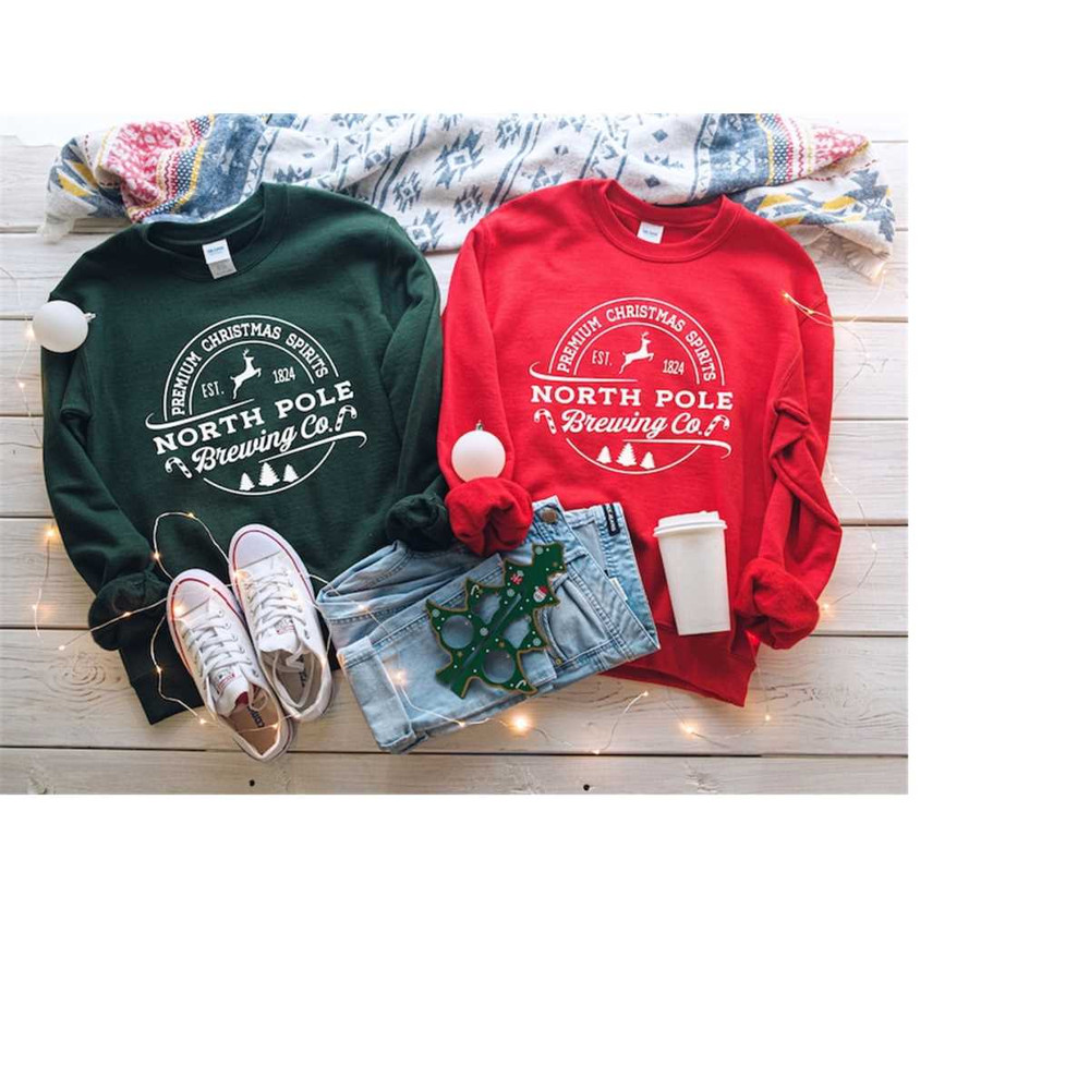 MR-2911202391127-north-pole-brewing-co-sweatshirt-christmas-crewneck-sweater-image-1.jpg