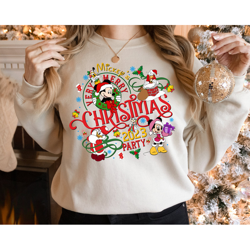 Mickey'S Very Merry Christmas Party 2023 Sweatshirt, Disney Santa Mickey And Minnie Xmas hoodie, Xmas Holiday hoodie.jpg