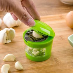 top stainless steel garlic press: manual mincer kitchen gadget for efficient slicing and dicing fruits