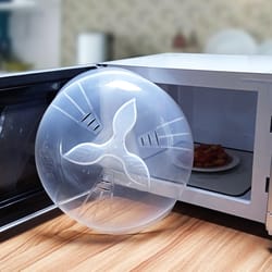 crystal clear microwave splatter cover with steam vents and easy grip handle