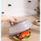Collapsible Microwave Splatter Cover with Easy Grip Handle and Food Strainer Basket