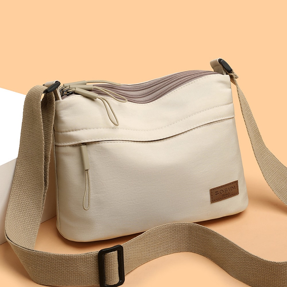UrbanEase Canvas Crossbody Bag for Women with Multi Pockets and Large Capacity