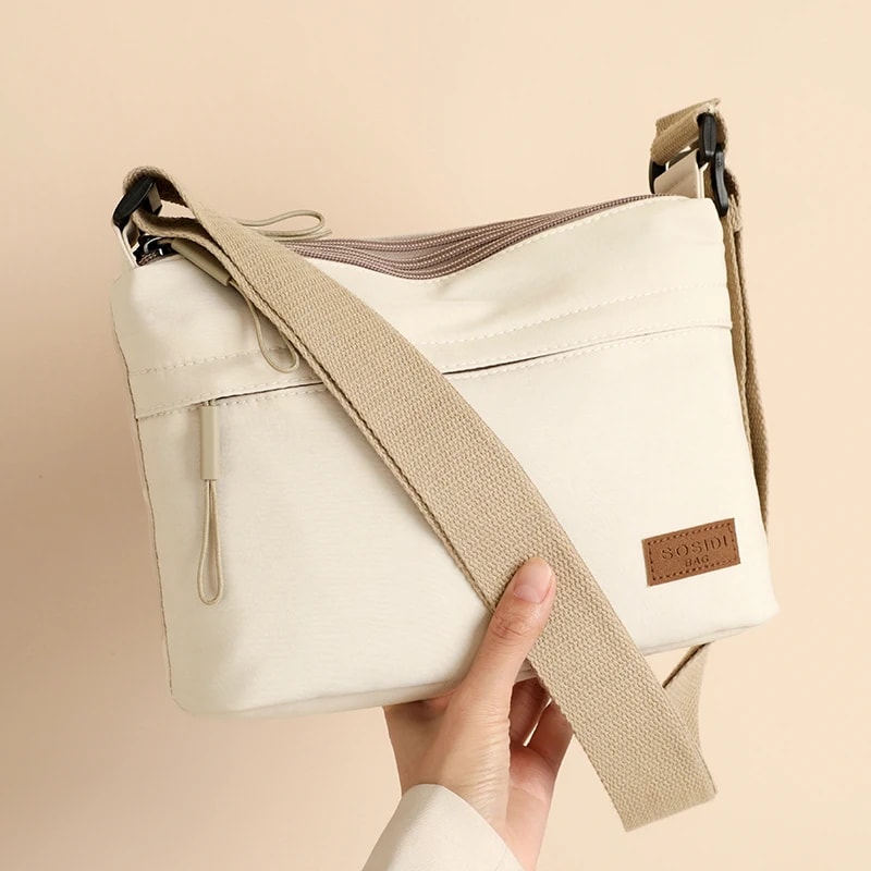 UrbanEase Canvas Crossbody Bag for Women with Multi Pockets and Large Capacity