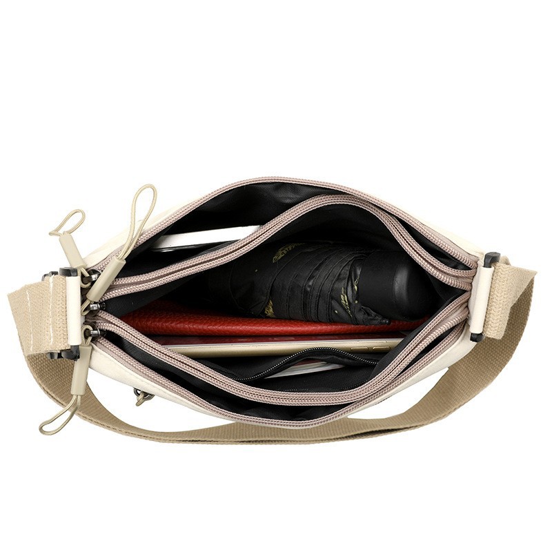 UrbanEase Canvas Crossbody Bag for Women with Multi Pockets and Large Capacity