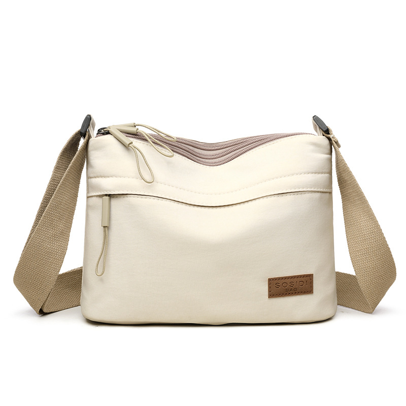 UrbanEase Canvas Crossbody Bag for Women with Multi Pockets and Large Capacity