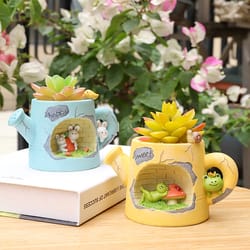 whimsical animal watering can planter for succulents & fairy garden decor