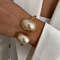 Smooth Heavy Metal Steampunk Bangle by Ingemark, Chunky Gold Arm Bracelet for Punk Hip Hop Fashion