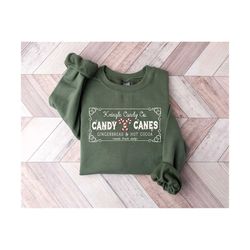 vintage christmas sweatshirt, kringle candy co. shirt, christmas candy sweatshirt, candy cane shirt, christmas crewneck