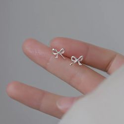 silver bow stud earrings for women: simple & minimalist ear piercing gift