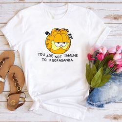 garfield cat funny t shirt, garfield you are not immune to propaganda shirt, garfield vintage shirt, garfield and friend
