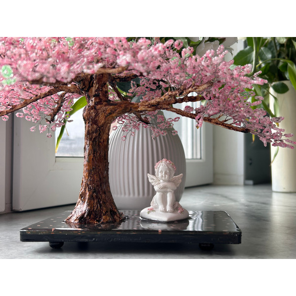 Pale-pink-cherry-tree-sculpture-with-angel.jpeg