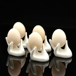 hand-shaped ceramic egg holder for soft and hard boiled eggs perfect for breakfast and brunch