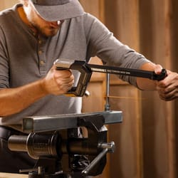 high tension hacksaw hand tool with adjustable angle and blade storage