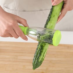 vegetable peeler with container and stainless steel blade