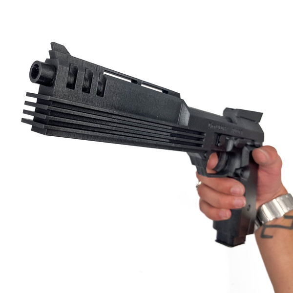 Auto 9 pistol – RoboCop 9.jpg