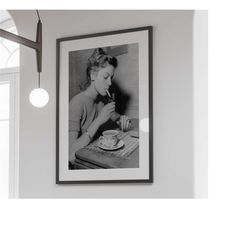 lauren bacall smoking poster, black and white, vintage