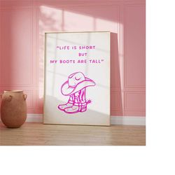 stylish pink cowgirl poster with 'life is short but my boots are long' quote - western themed printable wall art