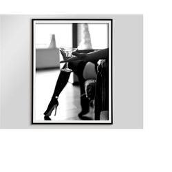 woman in high heels with glass of wine