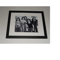 framed ac/dc bon scott, angus young, 1974 macolm