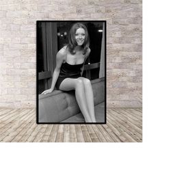 diana rigg sitting on the couch poster or