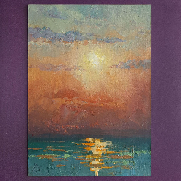 Orange reflections of sun on the ocean. The brush strokes and texture of paint in layers are visible to the naked eye.